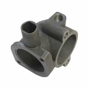 A Thermostat Housing - TR2-4A with multiple cylindrical openings and threaded holes, typically used for mechanical assemblies, isolated on a white background.