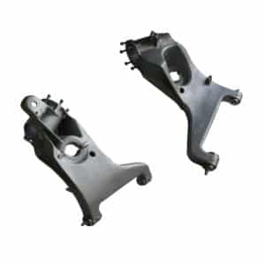 A pair of Racetorations Roller Bearing Trailing Arm Bush Conversion kits (TR4A-6) are shown against a white background, highlighting their metal construction, mounting points, and bolt holes.