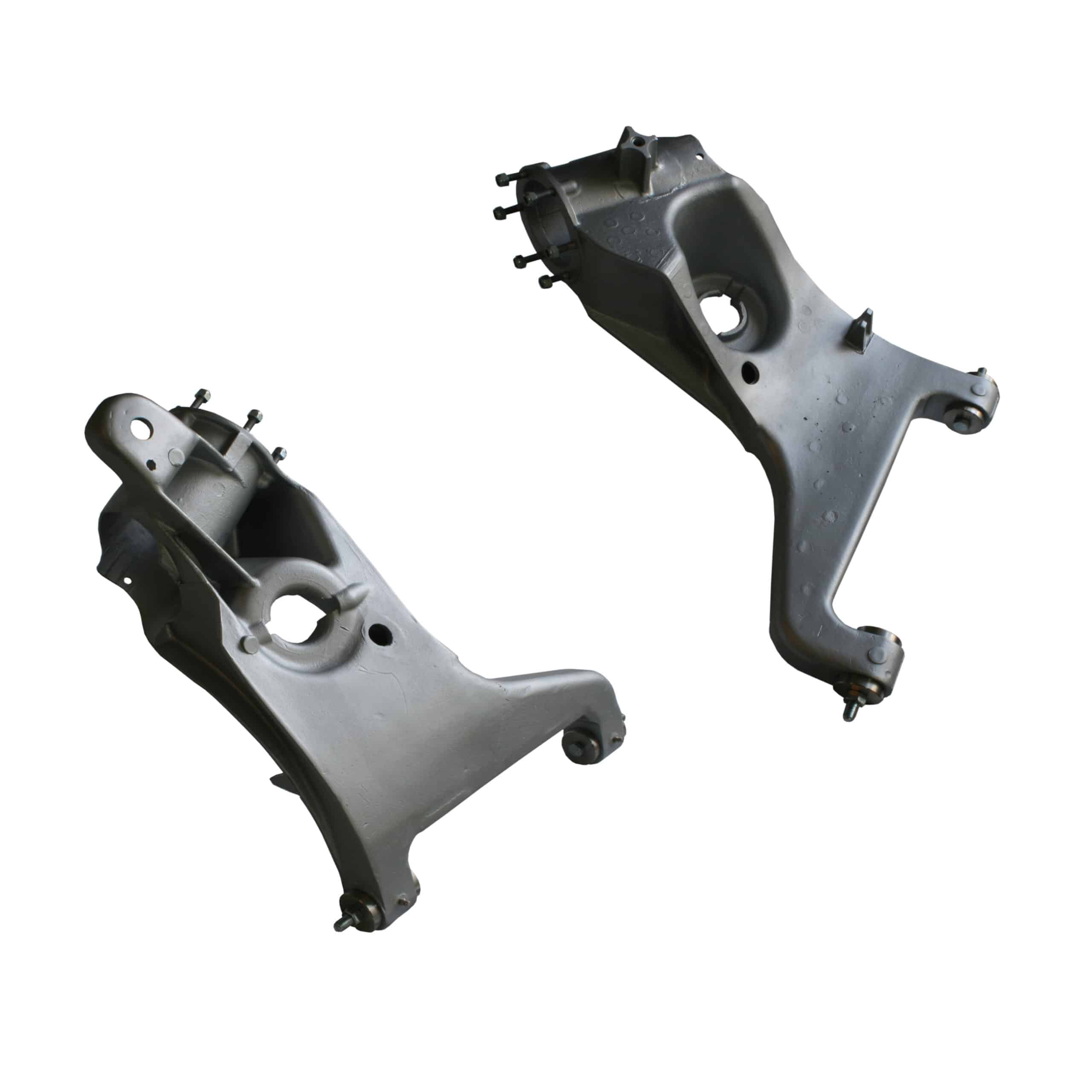 A pair of Racetorations Roller Bearing Trailing Arm Bush Conversion kits (TR4A-6) are shown against a white background, highlighting their metal construction, mounting points, and bolt holes.