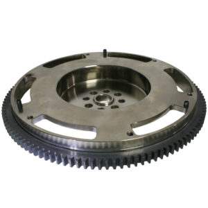 A Racetorations Lightweight Steel Flywheel with a gear-like circumference and a central hole, isolated on a white background, used in machinery to store rotational energy.