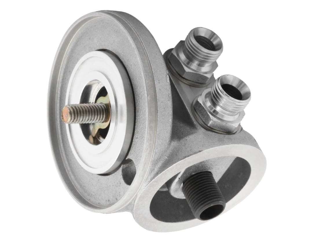 The Mocal Spin-On Oil Filter Conversion Kit c/w Oil Cooler Fittings for TR5-6 features threaded ports and oil cooler fittings for connecting oil lines, shown on a white background.