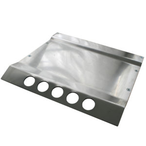 A shiny stainless steel Racetorations Sump Guard - TR5-6 with a folded edge and six circular holes on one side, isolated on a white background.