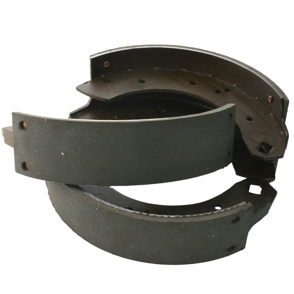 Set of four new Racetorations Mintex M20 Lined Uprated 10" Brake Shoe Set - TR3 automotive brake shoes isolated on a white background.