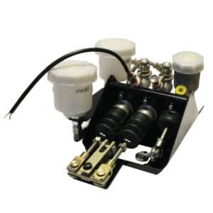 A brake system assembly with a black metal casing housing three cylindrical components, fluid reservoirs, and wiring against a white background.
