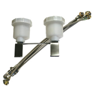 Two Racetorations Dual Brake Bias Master Cylinder Assemblies connected by metal braided hydraulic lines with fittings and brackets, isolated on a white background.