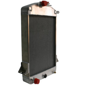 An isolated image of a car radiator, with a metallic frame and core, featuring upper and lower plastic tanks, against a white background.