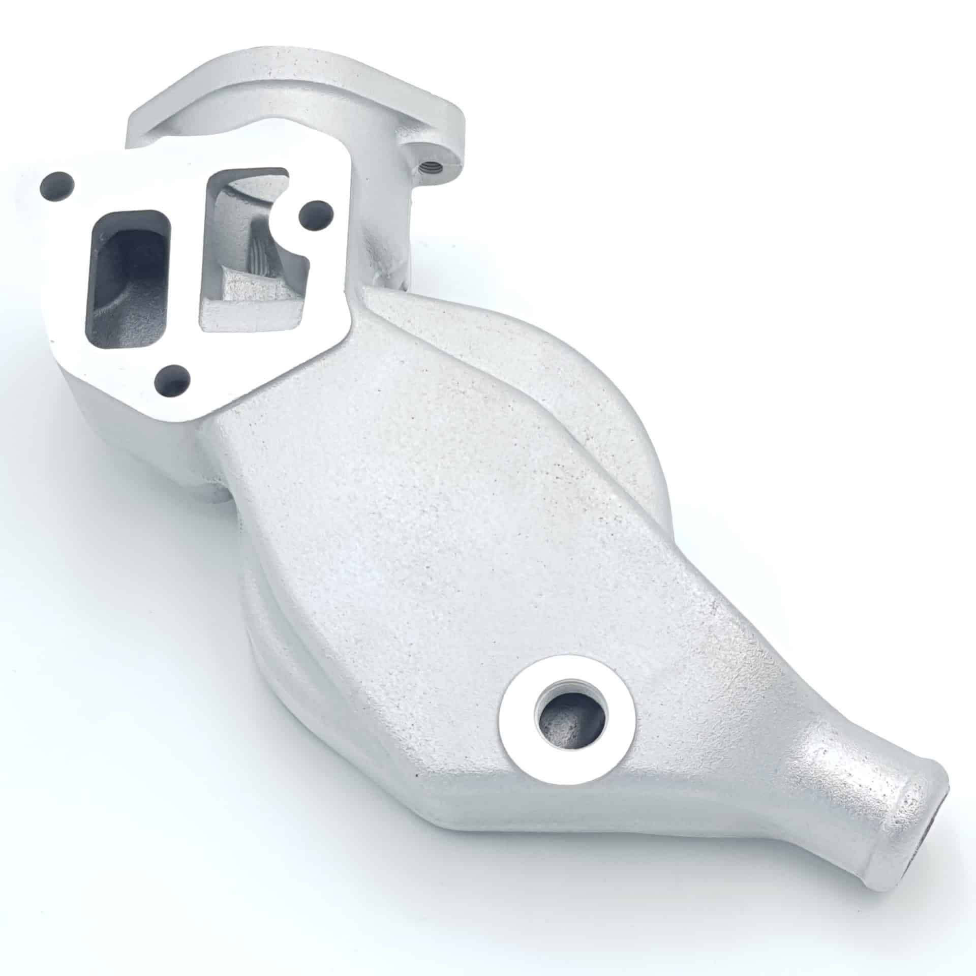 The Racetorations Aluminium Water Pump Housing for Triumph TR5, TR250 & TR6 features a rectangular mounting plate with two bolt holes and a cylindrical protrusion. Its silver metal surface has a slightly rough texture and is shown on a white background.