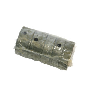 A traditional glutinous rice cake, tightly wrapped in banana leaves and fastened with twine, bearing visible Camshaft Block Bearing Set - TR5-6 through semi-translucent sections.