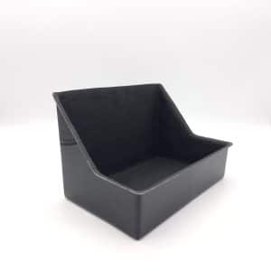 A black, rectangular plastic bin with angled sides and an open top, photographed on a white background—perfect as the Racetorations Fibreglass Battery Tray for TR4-6 models.