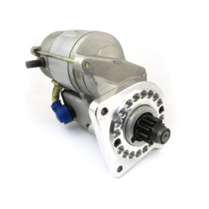 A PowerLite High Torque Starter Motor - Ferrari 308 with a metal body and a gear protruding from it, situated on a plain white background.