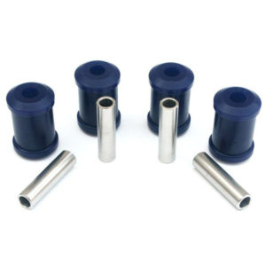 Four blue SuperPro Trailing Arm Bush Kits - TR4A-6 with metal sleeves, displayed on a white background.