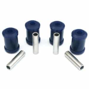 Four blue SuperPro Trailing Arm Bush Kits - TR4A-6 with metal sleeves, displayed on a white background.
