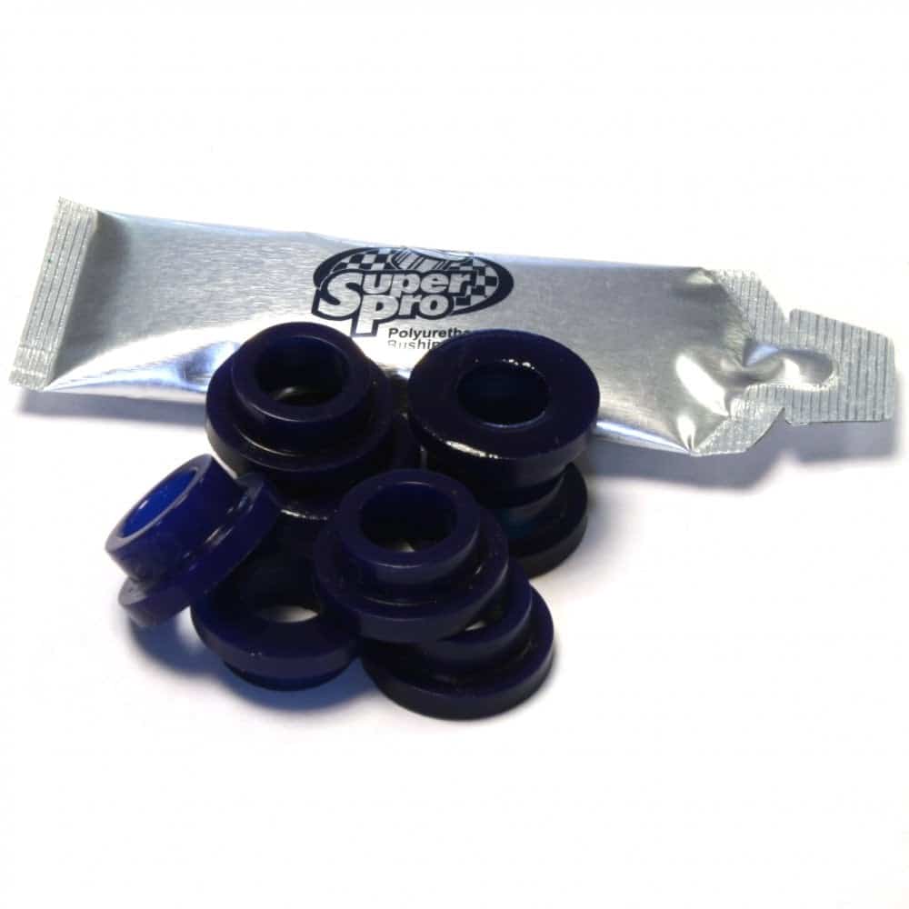 A pack of "SuperPro Fan Mount Bush Kit, TR2-6, Vitesse (Rotoflex), GT6, 2000 & 2500" small blue bushings displayed in front of their metallic silver packaging, set against a white background.
