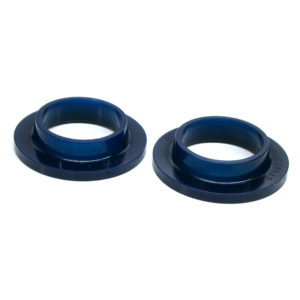 Two SuperPro Polyurethane Front Spring Spacer, Pair - TR2-6 on a white background, each seal has a flanged edge and a glossy finish, designed for use in a mechanical assembly to prevent leaks.