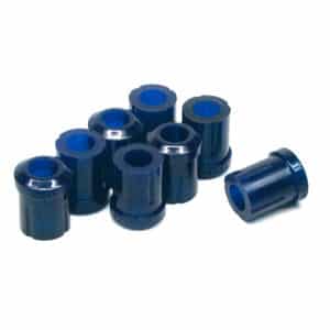A group of SuperPro Leaf Spring Shackle Polyurethane Bush Kit - TR2-4 with blue tops, scattered on a light background.