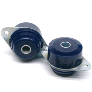 Two blue industrial shock absorbers with silver SuperPro Polyurethane Rear Differential Mount Kit - TR5-6 mounting brackets, isolated on a white background.