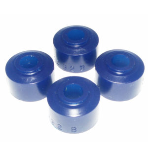Four blue rubber laboratory stoppers with alphanumeric codes, placed on a white background from SuperPro Front Anti-Roll Bar Drop Link Bush Kit TR2 - 6.