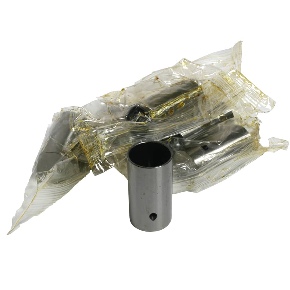 A Racetorations Fast Road Camshaft Follower Set for TR2-4A & Morgan +4 is displayed in front of other similar metal components, all appearing as mechanical parts with some wrapped in clear plastic packaging.