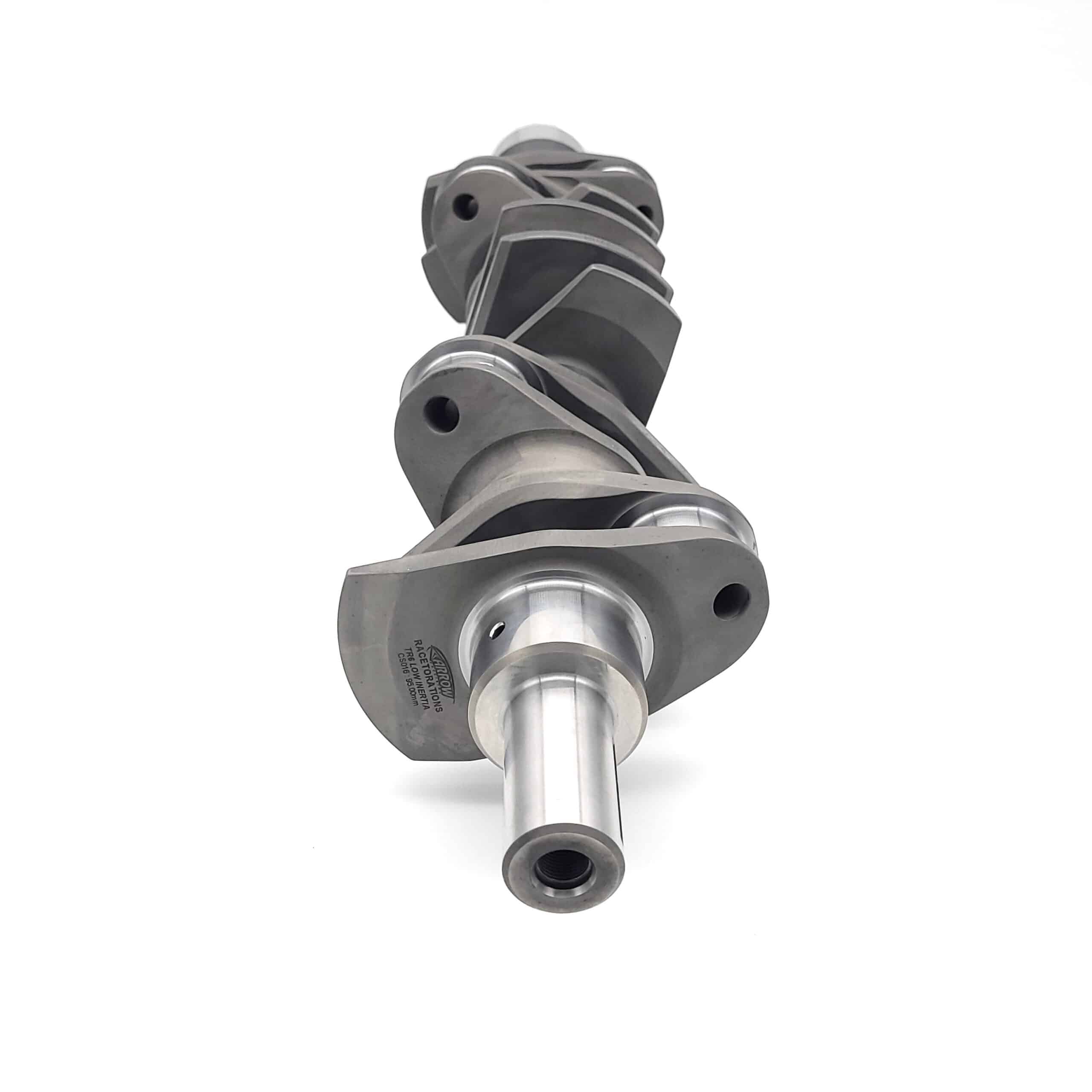 An Arrow Precision Engineering Billet Steel Race Crankshaft for TR5-6, featuring offset lobes and machined surfaces, is set against a white background and photographed at an angle to display its cylindrical ends and intricate design.