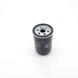 A black Spin-On Oil Filter for Triumph TR2-TR6 with a metal top and several holes stands upright on a white background. White instructions and symbols are printed on the side of the filter.