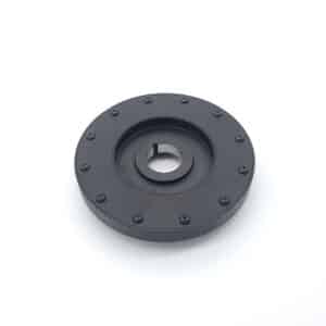 A round, black metal Sterling “Rattler” Torsional Vibration Crankshaft Damper, Competition - TR5-6, with a central hole and multiple small bolts in a circle, is shown on a plain white background.