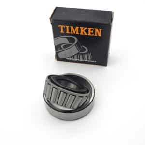 A Timken Rear Hub Bearing - TR3-4 is shown partially assembled in front of its black and orange branded box, which features an image of similar bearings.