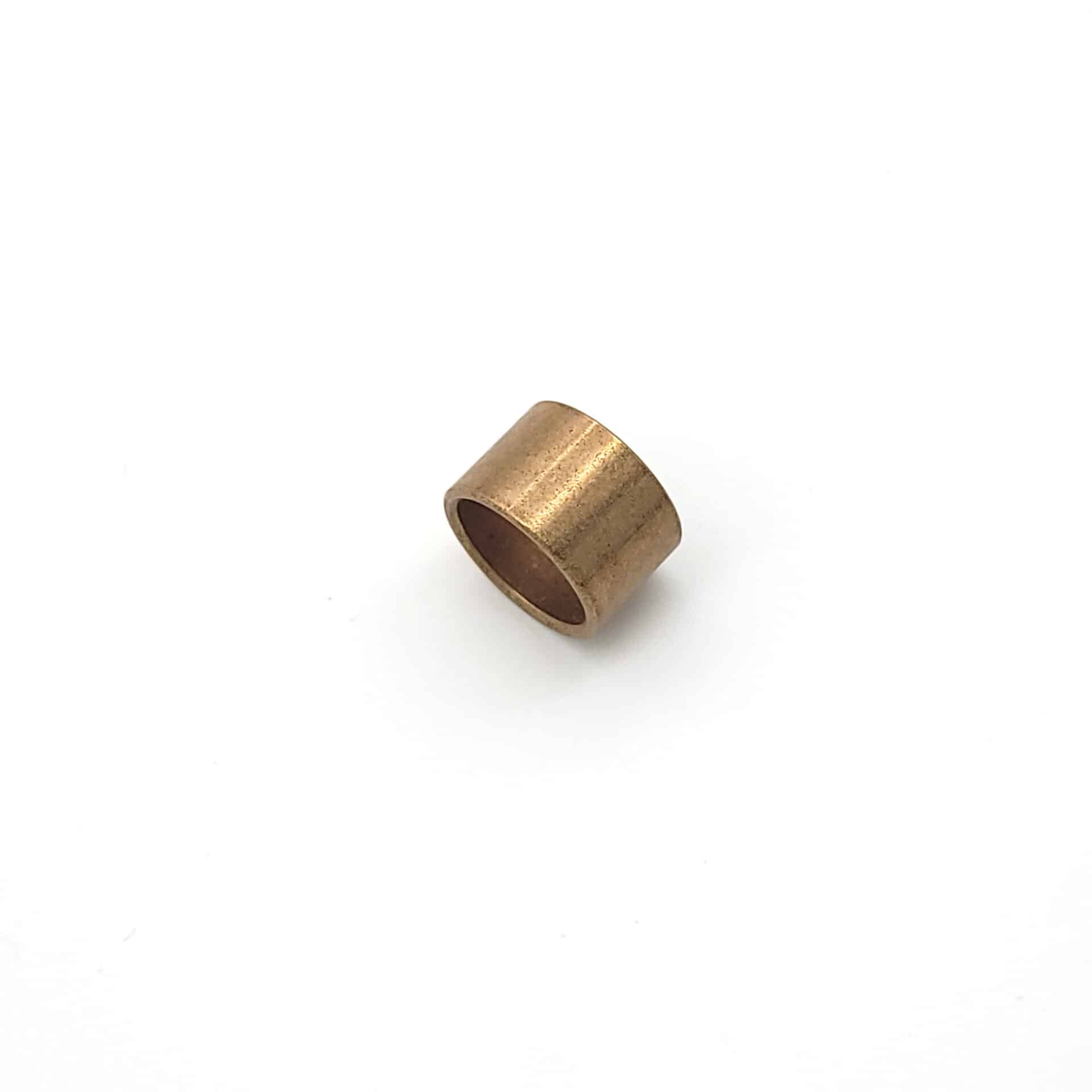A small, cylindrical bronze Brake & Clutch Pedal Bush - TR2-4A with a hollow centre, designed for TR2-4A models, displayed on a plain white background.