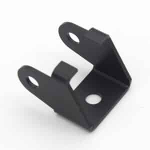 A black metal bracket with three mounting holes, two on upright flanges and one on the base, designed for attaching or supporting components.