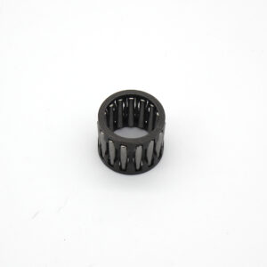 A cylindrical needle roller bearing with an open cage design is placed upright on a plain white background. The bearing has evenly spaced metal rollers inside a black cage.