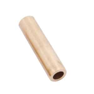 A Conversion Valve Guide - 3/8" to 5/16" for Triumph TR2 to TR4, featuring a cylindrical brass design with a hollow centre, is lying diagonally on a white background.
