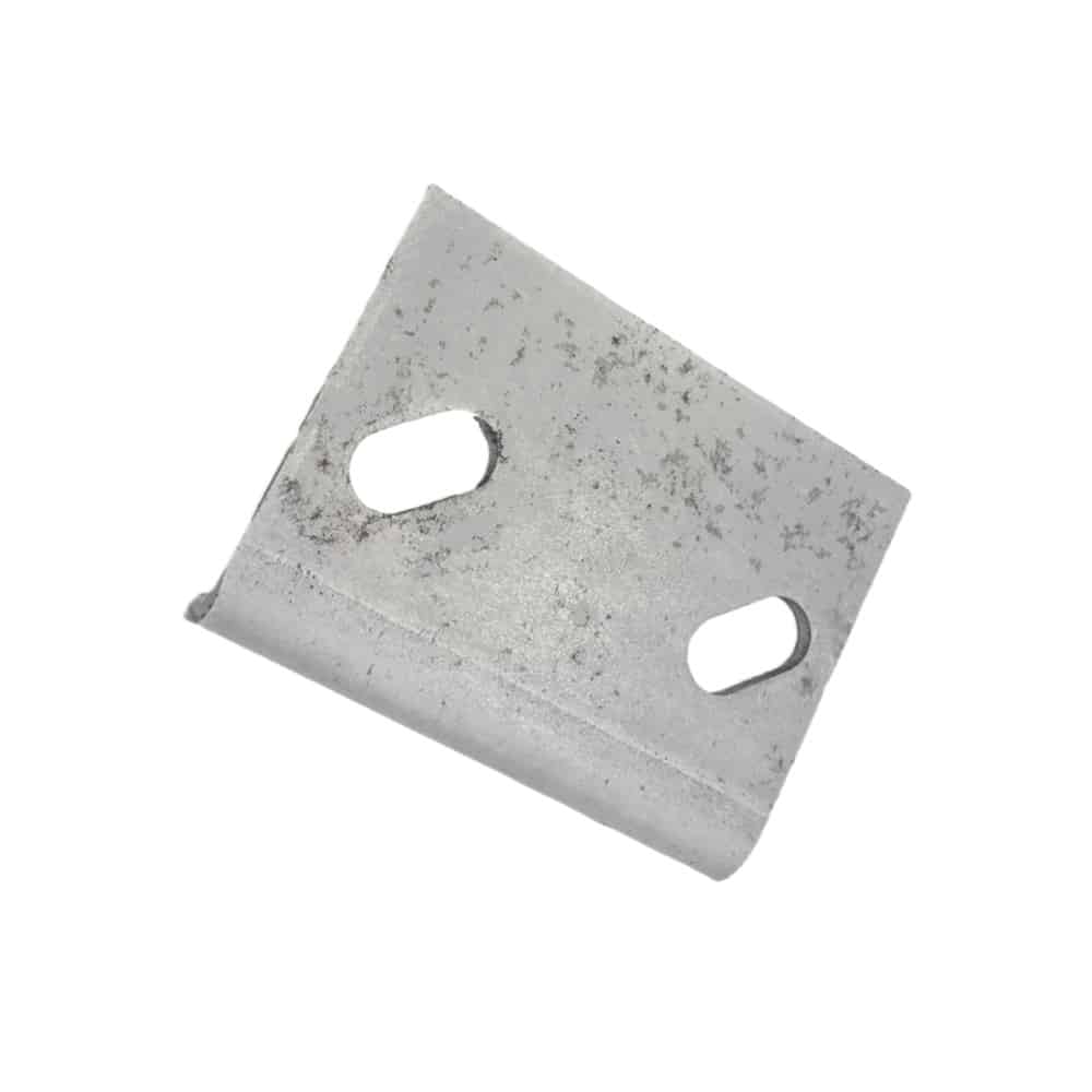 A small, rectangular metal plate—a Steering Rack Mounting Reinforcement Plate for Triumph vehicles—rests on a white background. Its slightly rough, unfinished surface suggests a focus on durability and robust functionality.